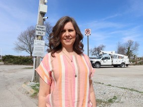 Helen Van Sligtenhorst is asking for the wording on signs at a parking lot used by Sarnia city staff to be changed, to let people know it's open for public parking after hours, and on holidays and weekends. (Paul Morden/The Observer)