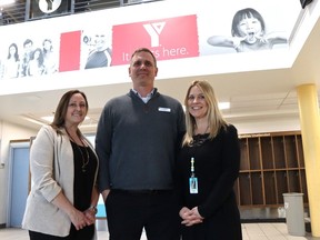 Project Search, a new school-to-work training program in Sarnia for graduating high school students with disabilities, launches in September. From left, Krista Gillespie and Joe Cebulski, left, of the YMCA of Southwestern Ontario, join Jen Morrow of the St. Clair Catholic District school board at a recent Y open house for the program. (Paul Morden/The Observer)