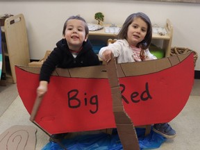 Felix Mathers, 3, left, and Talia Trembley, 4, paddle in the "Big Red" canoe, one of the activities Thursday during the Great Outdoors-themed Move-a-Thon at the YMCA Learning and Career centre child care in Sarnia. The annual fundraiser supports a program helping families with financial needs afford memberships and program at the YMCA of Southwestern Ontario.