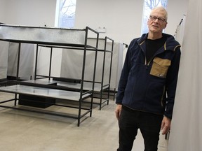 River City Vineyard pastor George Esser stands in the expanded men's section of the Sarnia church's homeless shelter in December 2023. (Tyler Kula/ The Observer Files)