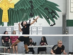 North Park Collegiate's Christian Alagna smashes the shuttlecock on Thursday behind partner Niahm Kukla during the AABHN senior badminton championship at St. John's College. Submitted