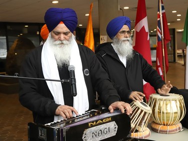 Piara Singh, left, and Gurkirpal Singh, of the local Sikh temple, perform at a ceremony marking Sikh Heritage Month at Tom Davies Square in Sudbury, Ont. on Wednesday April 3, 2024. A flag-raising ceremony was also held as part of the event. John Lappa/Sudbury Star/Postmedia Network