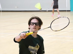 Austin Dollar, of Confederation Chargers, returns the birdie during action at the Sudbury Invitational Badminton Tournament at St. Benedict Catholic Secondary School in Sudbury, Ont. on Friday April 5, 2024.