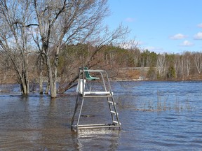 Water from Vermilion River has started to flood Centennial Park in Whitefish, Ont. on Monday April 15, 2024.
