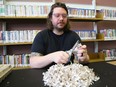 Emerging technology librarian Ben Smeets cuts recycled scrap paper to create new paper from pulp and wildflower seeds at Earth Day celebrations at the main branch of the Greater Sudbury Public Library in Sudbury, Ont. on Monday April 22, 2024.