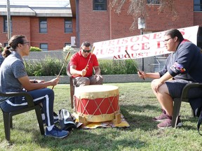 In this file photo, members of the N'Swakamok Native Friendship Centre men's drumming group perform an honour song at a commemoration ceremony for Prisoners' Justice Day in Sudbury. Critics say the lack of a Gladue writer in Sudbury is hurting Indigenous people navigating the legal system. John Lappa/Sudbury Star/Postmedia Network