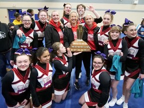 Waterford District High School's cheer team celebrates winning the 2024 Norfolk Invitational Cheerleading Competition on March 27 in Simcoe.