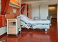 Stock image of an empty hospital bed. Timothy Huliselan/Pexels