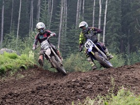 Jim Frederickson and Michael King raced along the track at WhiteRidge MX Park near Blue Ridge in 2023. Heather Anderson, Woodlands County community services co-ordinator, talked about how groups like the Whitecourt Motocross Association or Whitecourt Mountain Bike Association could potentially benefit from a new community development fund.