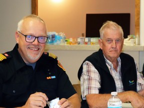 Fire Chief Randy Schroeder, left, spoke to Lac Ste. Anne County (LSAC) councillors like Lloyd Giebelhaus about preparations for the 2024 wildfire season during council's April 11 meeting. In 2023, wildfires forced numerous evacuations across LSAC, with evacuees directed to the Mayerthorpe Diamond Centre.