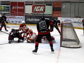Whitecourt Wolverines (l-r) Spencer Rheaume and Travis Verbeek assisted Braden Keeble in scoring against the Calgary Canucks.