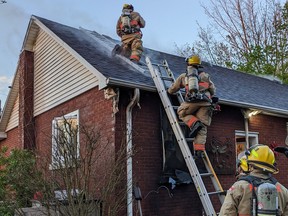 Norfolk County firefighters contained a fire to the attic at a Sovereign Street home in Waterford on Wednesday morning.
