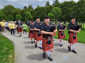 The Branch 642 Royal Canadian Legion Pipe Band, led by Walt Tomaszewski, at front left, kicks off the Chatham-Kent Hike for Hospice on Sunday at Mud Creek Trail. (Trevor Terfloth/The Daily News)