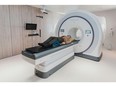 A person is receiving an MRI test