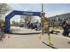 Pictured is Sarah Mulcahy, who broke her own record at the Fredericton Marathon on Sunday.