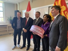 Federal Health Minister Mark Holland, UNB president Paul Mazerolle, Education Minister Bill Hogan, federal Minister for Women and Gender Equality and Youth Marci Ien, and federal Minister of Intergovernmental Affairs Dominic LeBlanc.