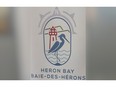 heron bay sign