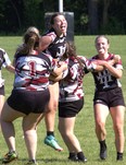 Players on Holy Trinity Catholic High School’s girls rugby team celebrate their AABHN semifinal win over Brantford Collegiate Institute on Monday at the Harlequins Grounds. Brian Smiley