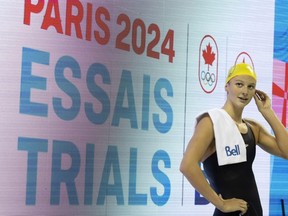 Canadian swimmer Summer McIntosh celebrates her world record swim in the women’s 400 meter IM during the Canadian Olympic Swimming Trials at the Toronto Pan Am Sports Centre on May 16, 2024.