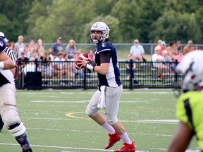 Sudbury Spartans quarterback Adam Rocha (17) prepares to throw a pass against the Toronto Phantom Raiders during Northern Football Conference quarter-final action at James Jeroms Sports Complex in Sudbury, Ontario on Saturday, August 6, 2022.