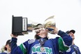 Player kissing a trophy