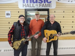 Larry Cook, Chuck Dickie and Rob Croft, shown left to right, installed wall panels, display cabinets and signage at the new Bruce Grey Music Hall of Fame, now located in the North Atlantic Room at the Owen Sound legion.