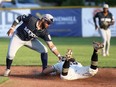 London Majors shortstop Tommy Reyes-Cruz (21) tags out Chatham-Kent Barnstormers' Braxton Haggith (23) at second base during an Intercounty Baseball League game at Fergie Jenkins Field at Rotary Park in Chatham, Ont., on Tuesday, May 21, 2024. Mark Malone/Chatham Daily News/Postmedia Network