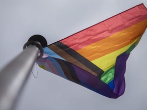 Pride flag on a flagpole