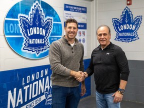 Former London Knight and NHL player Brandon Prust, left, shakes hands with London Nationals general manager Tony Mandarelli at the Western Fair District Sports Centre in London on Friday, April 26, 2024, after the team announced Prust as the new Nationals coach. (Derek Ruttan/The London Free Press)