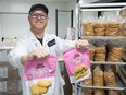 James McInnes, co-founder and chief executive of Odd Burger, displays some of the company's vegan food offerings at its production facility on Consortium Court in London on Thursday, May 2, 2024. (Derek Ruttan/The London Free Press)
