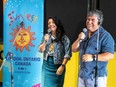 Mercedes Caxaj, left, and her father Alfredo Caxaj announce the lineup of artists for the 30th edition of Sunfest at the London Brewing Co-operative on Thursday, May 16, 2024. (Derek Ruttan/London Free Press)