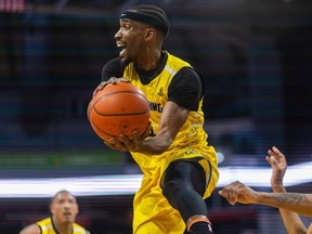 Jeremiah Mordi of the London Lightning tries to save a rebound heading out of bounds during a Basketball Super League game at Budweiser Gardens in London on Sunday, March 17, 2024. (Mike Hensen/The London Free Press)
