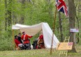Members of the British side confer beneath a lean-to during a weekend re-enactment of the Battle of Longwoods at the Longwoods Road Conservation Area near London. The event is held each year through the Upper Thames Military Re-enactment Society and the Lower Thames Valley Conservation Authority. (Mike Hensen/The London Free Press)