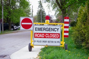 A sign marking Sparling Street as closed.