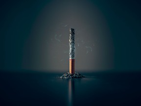 A cigarette burning down