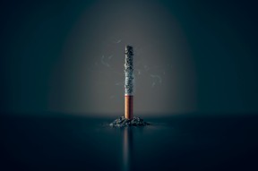 A cigarette burning down