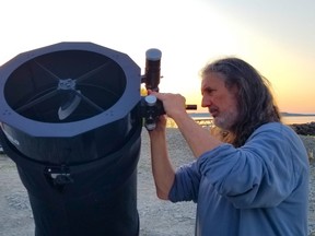 Steve Ritchie sets up his Dobsonian telescope before an Owen Sound Sidewalk Astronomy viewing at Big Bay, Ont. on Saturday, May 18, 2024. (Scott Dunn/The Sun Times/Postmedia Network)