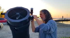 Steve Ritchie sets up his Dobsonian telescope before an Owen Sound Sidewalk Astronomy viewing at Big Bay, Ont. on Saturday, May 18, 2024. (Scott Dunn/The Sun Times/Postmedia Network)
