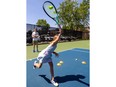 Emilia Urkedal, 11, who plays four to five times a week, shows her serve during an open house at Pinafore Tennis Club in St. Thomas on Sunday May 26, 2024. (Mike Hensen/The London Free Press)