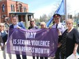 A flag-raising is held Tuesday at the Civic Centre in Chatham to mark sexual violence awareness month in May. Attending is Tara Greenway, left, sexual assault domestic violence co-ordinator and clinical resource nurse at CKHA, Mayor Darrin Canniff, Coun. Alysson Storey, Karen Hunter, executive director of the Chatham-Kent Women's Centre, Chatham-Kent police Chief Gary Conn, and Linda Soulliere, executive director of the Chatham-Kent Sexual Assault Crisis Centre. (Ellwood Shreve/Chatham Daily News)