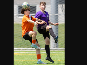 Clarke Road’s Jaxson Inglis (left) competes with Layne Wecker of West Elgin during their TVRA boys high school soccer game at Tricar Field in London on Tuesday May 21, 2024. Derek Ruttan/The London Free Press