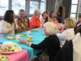 It didn't take long for everyone to make friends and have a great time at the Mother's Day Tea held at the community building in Lansdowne by the Leeds and Thousand Islands Historical Society on May 5. Lorraine Payette/for Postmedia Network