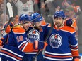 Edmonton Oilers' Leon Draisaitl (29) celebrates his goal with teammates against the Vancouver Canucks during first period second-round NHL playoff action in Edmonton on Tuesday, May 14, 2024 in Edmonton.