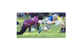 Brantford Collegiate Institute’s Jack Conway scores a try against Assumption College on Thursday at the Harlequins Grounds during an AABHN senior boys rugby semifinal game. Brian Smiley