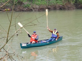 St. Clair Region Conservation Authority chair Pat Brown, left, and board member Emery Huszka cross the finish line at the 2024 Sydenham River Canoe and Kayak Race.