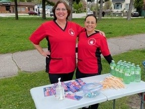 Dental hygienists Darlene Falls, left, and Stacy Rogers, visited Rainbow Park in Sarnia April 28, 2024, to hand out oral hygiene supplies and offer advice.