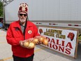 Stephen MacNeil, president of the Lambton Shrine Club, is on duty Wednesday on the first day of the club's annual Vidalia onion sale fundraiser in a parking lot under the Blue Water Bridge in Point Edward. Proceeds go to the Shriners Hospital for Children in Montreal.