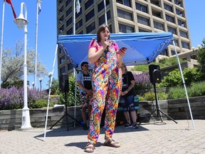 Beth Dekker, co-founder of Queer and Questioning Sarnia, speaks Friday at a Pride flag raising held on Sarnia's waterfront, ahead of the start of Pride month in June.