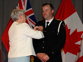 Sudbury native Matt Hickey receives the Ontario Medal for Paramedic Bravery from Edith Dumont, the Lieutenant Governor of Ontario. Supplied