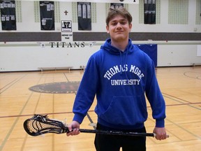 Holy Trinity Catholic High School student Jase Macaulay recently signed a lacrosse scholarship with the intention of playing at Thomas More University in Kentucky. CHRIS ABBOTT